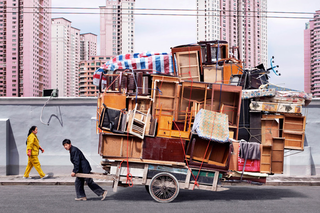 Illustration for article titled Chinese People Pulling Insane Loads